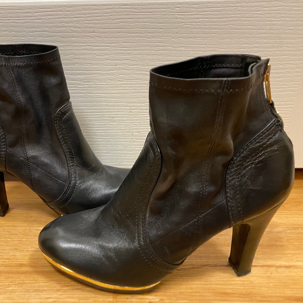 Tory Burch black with gold zippers